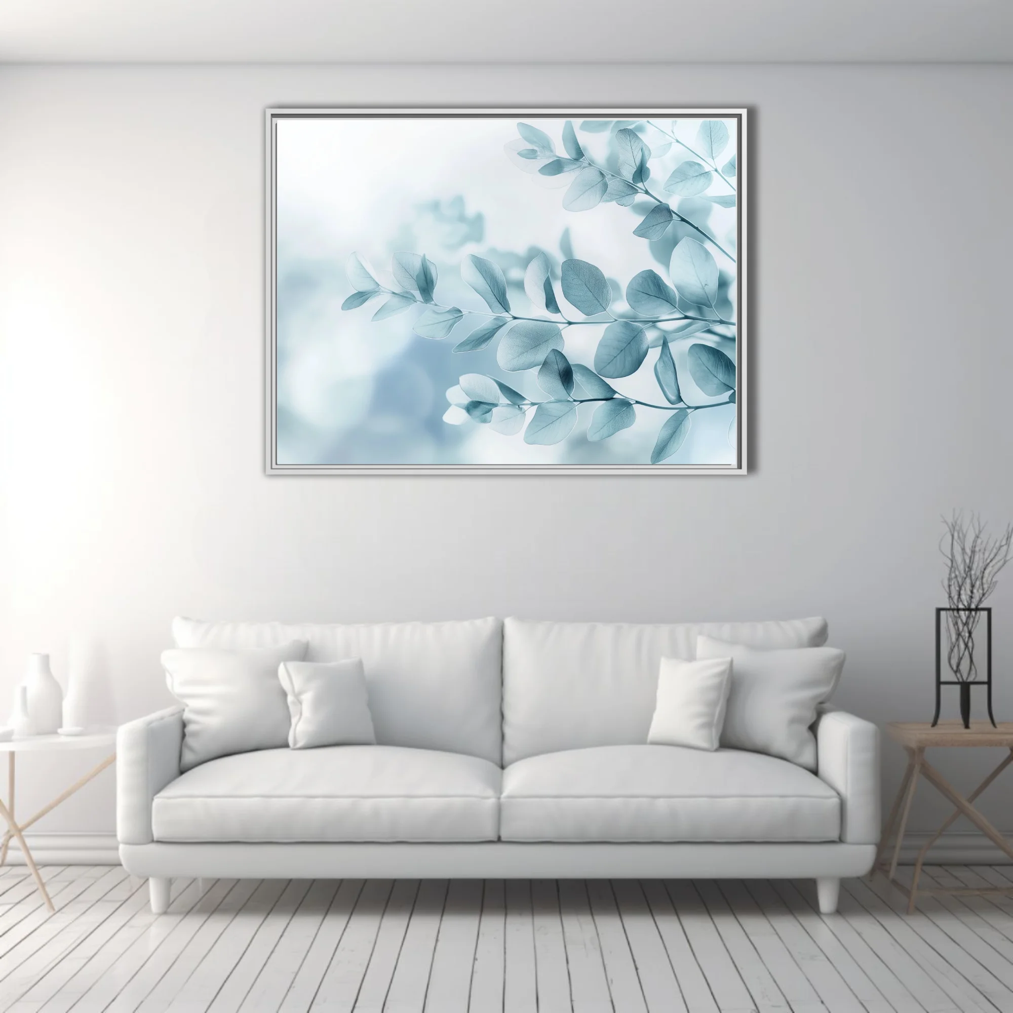 Minimalist botanical print of translucent blue-grey eucalyptus leaves on soft white ground