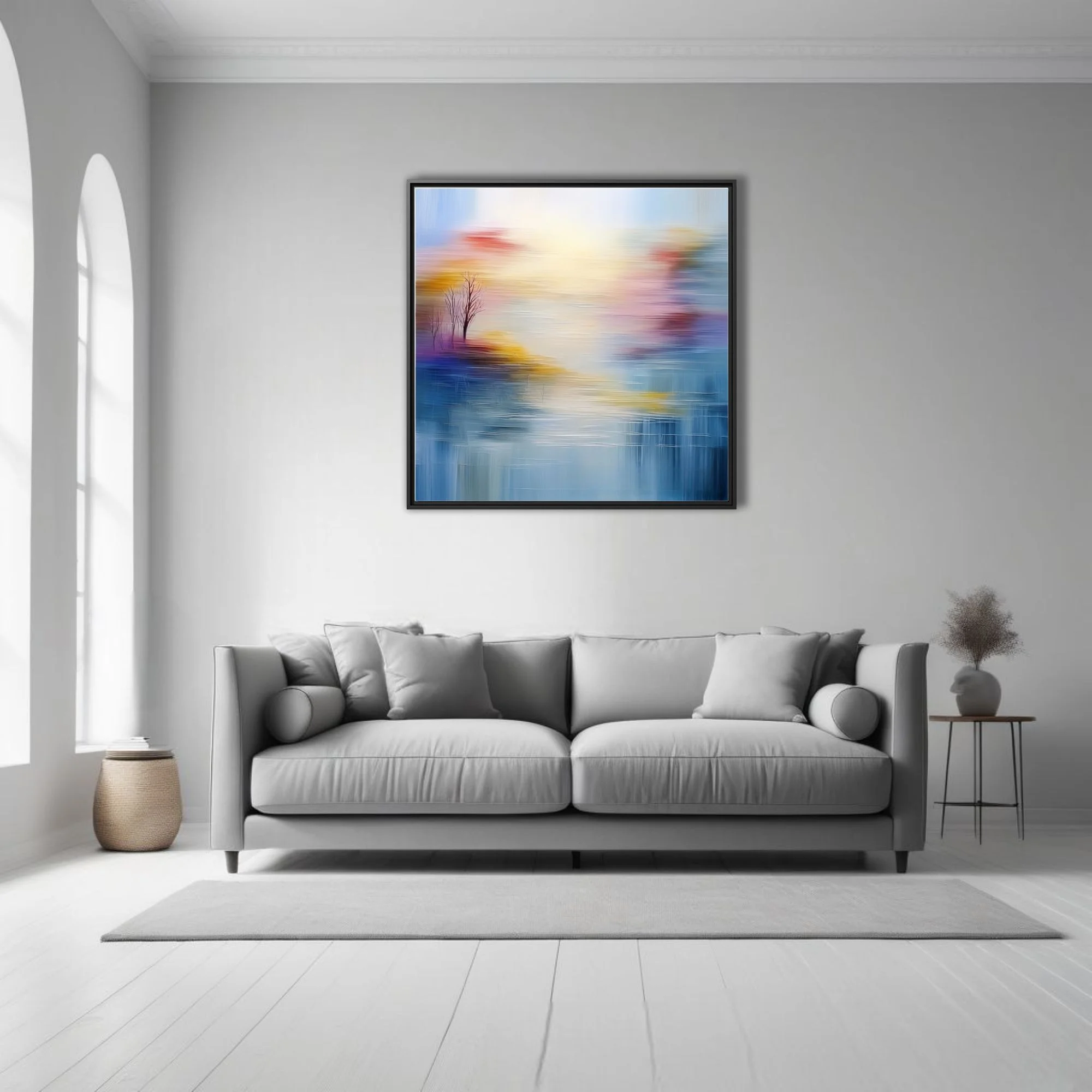 Soft-focus abstract landscape in hazy blue, gold and blush with bare tree silhouettes