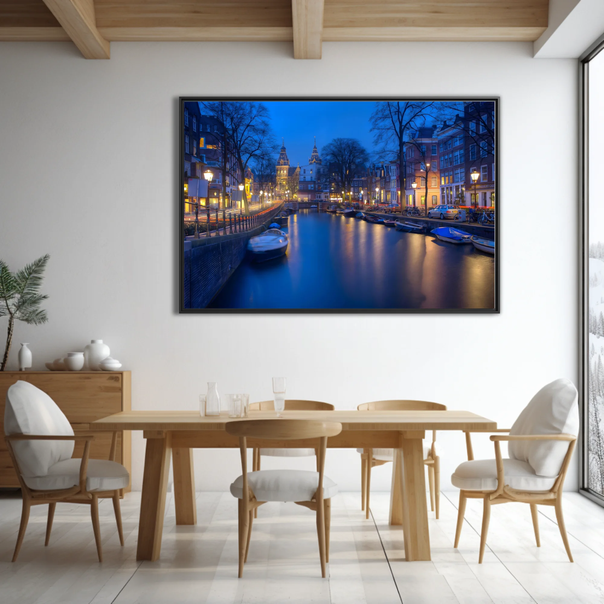 Amsterdam canal at twilight, long-exposure photo with blue tones and golden lantern reflections