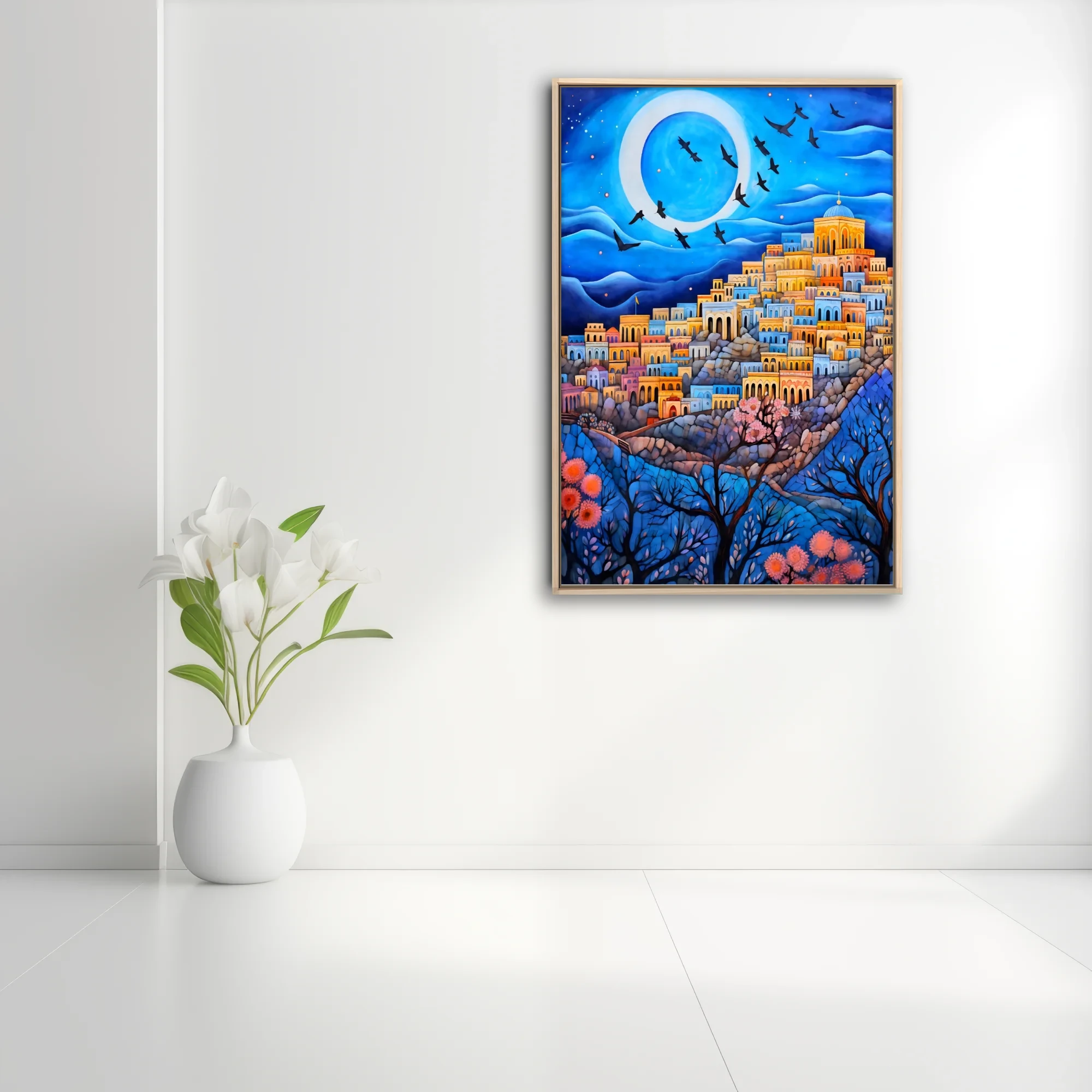 Whimsical folk-art Mediterranean hillside city at night with moon, birds and blossoms in blue and gold