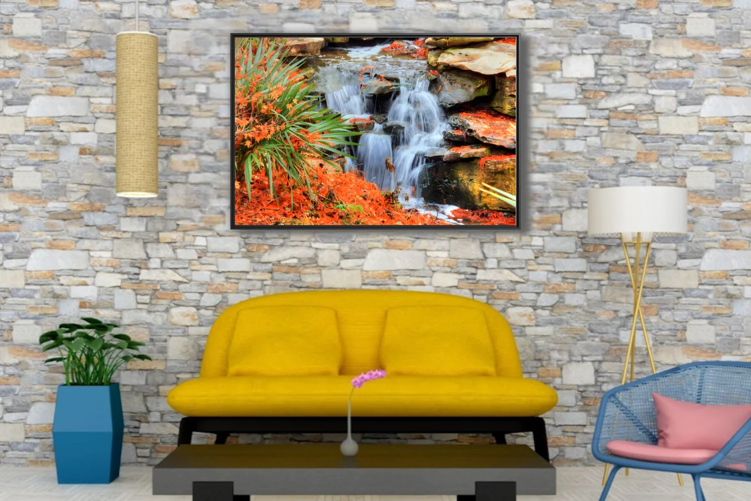 Cascading waterfall over mossy rocks with vivid orange foliage and green palms