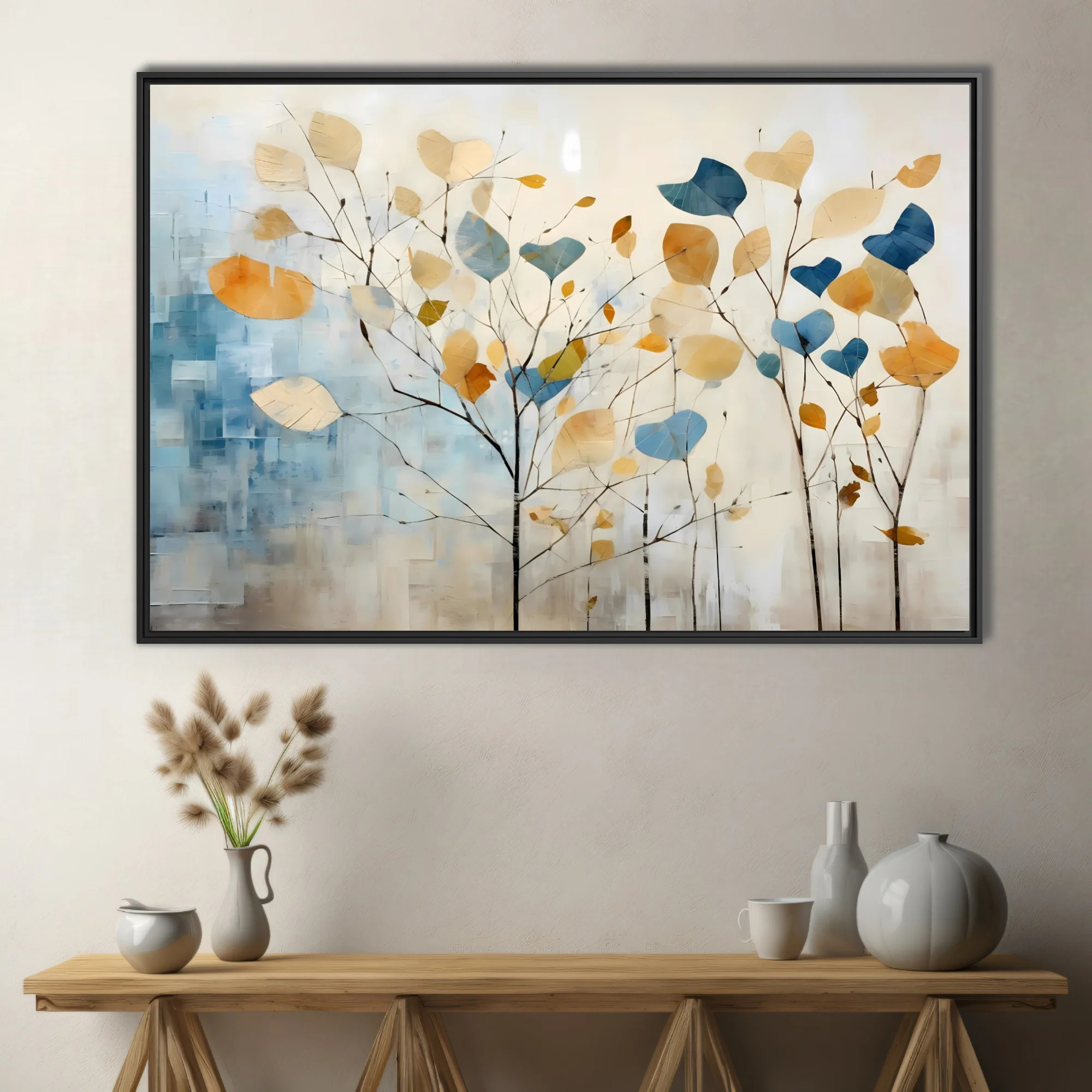 Abstract botanical wall art with oversized leaves in blue, amber, and cream on bare branches