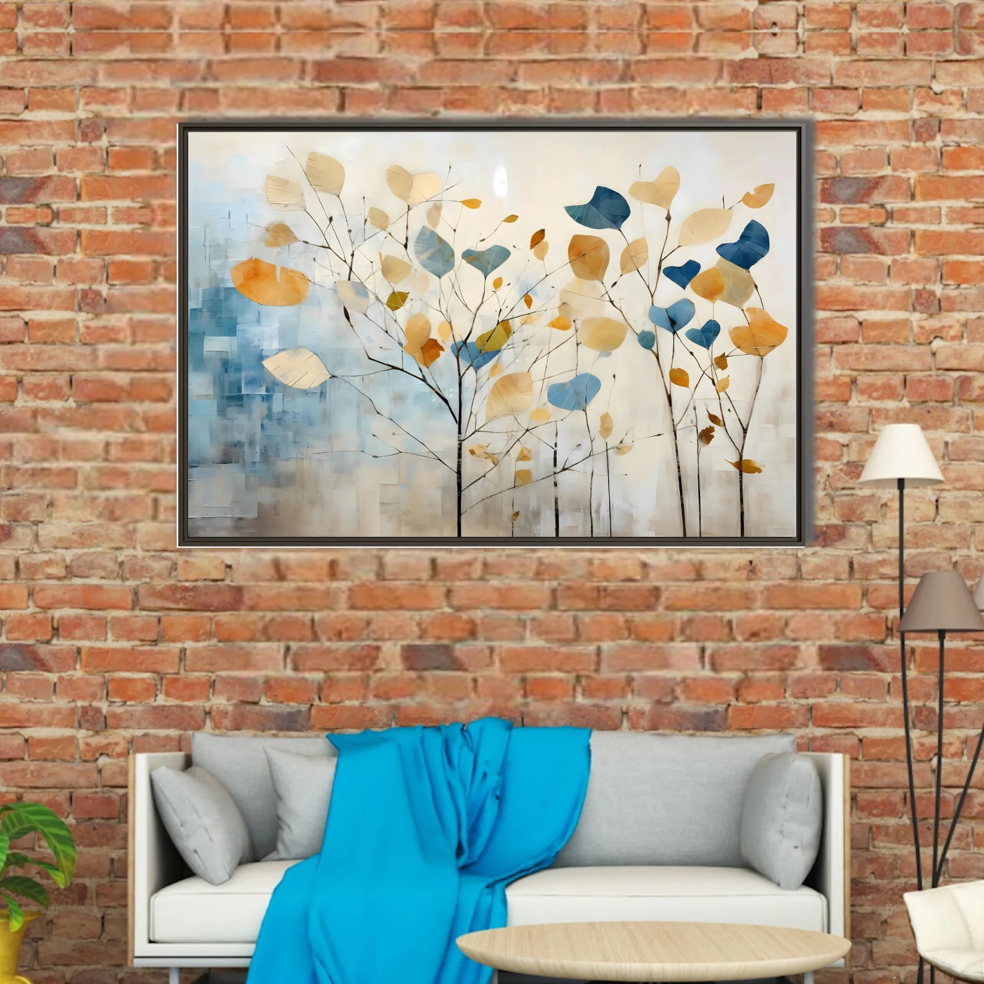 Abstract botanical wall art with oversized leaves in blue, amber, and cream on bare branches