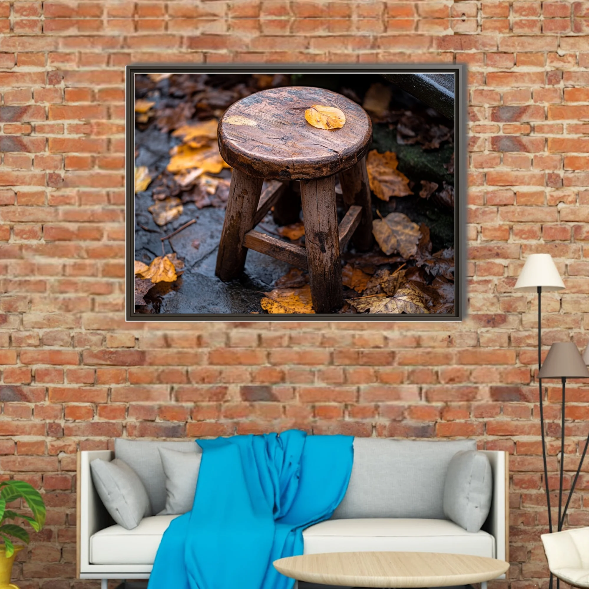 Rustic weathered wooden stool with autumn leaves, earthy amber tones, seasonal still life