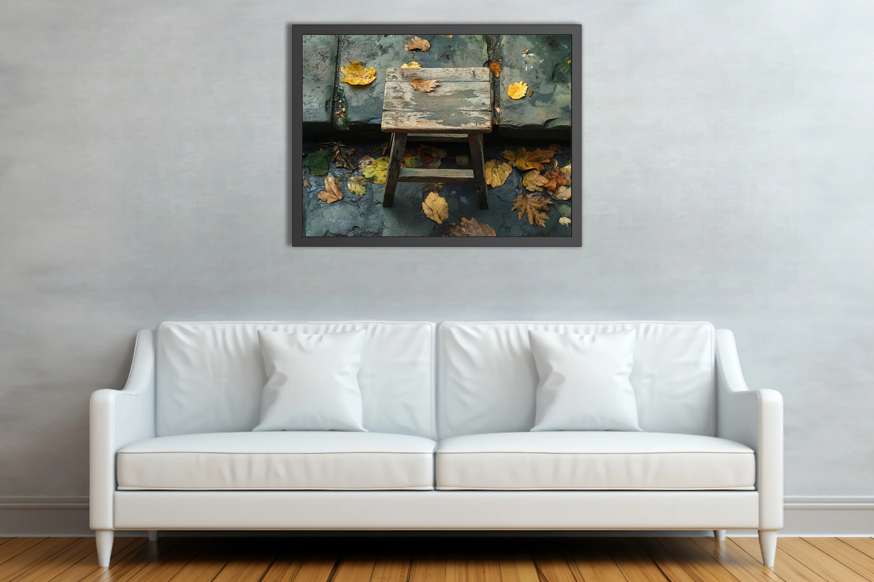 Rustic weathered wooden stool with fallen autumn leaves on aged stone