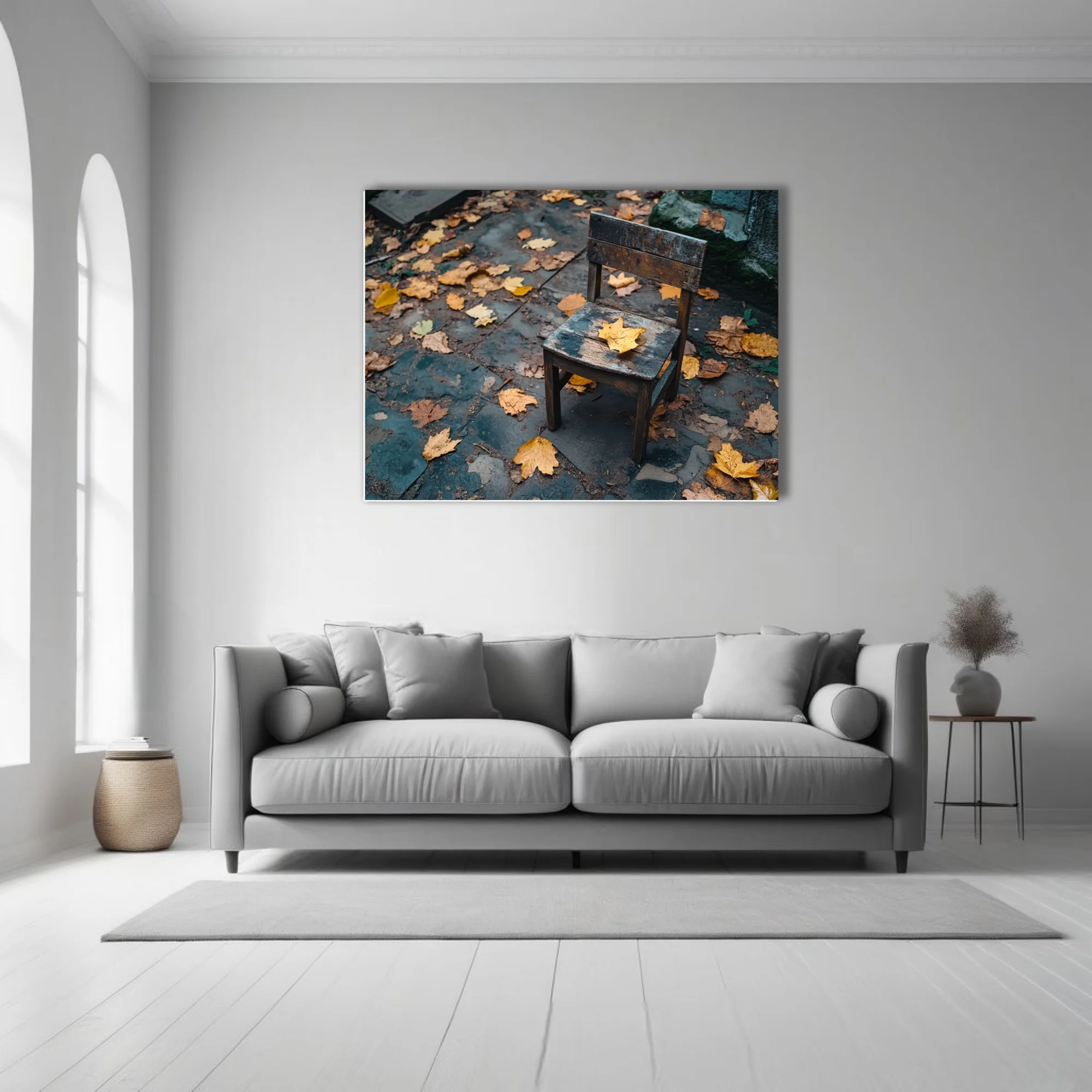Weathered wooden chair with autumn leaves on mossy stone paving, moody fall palette