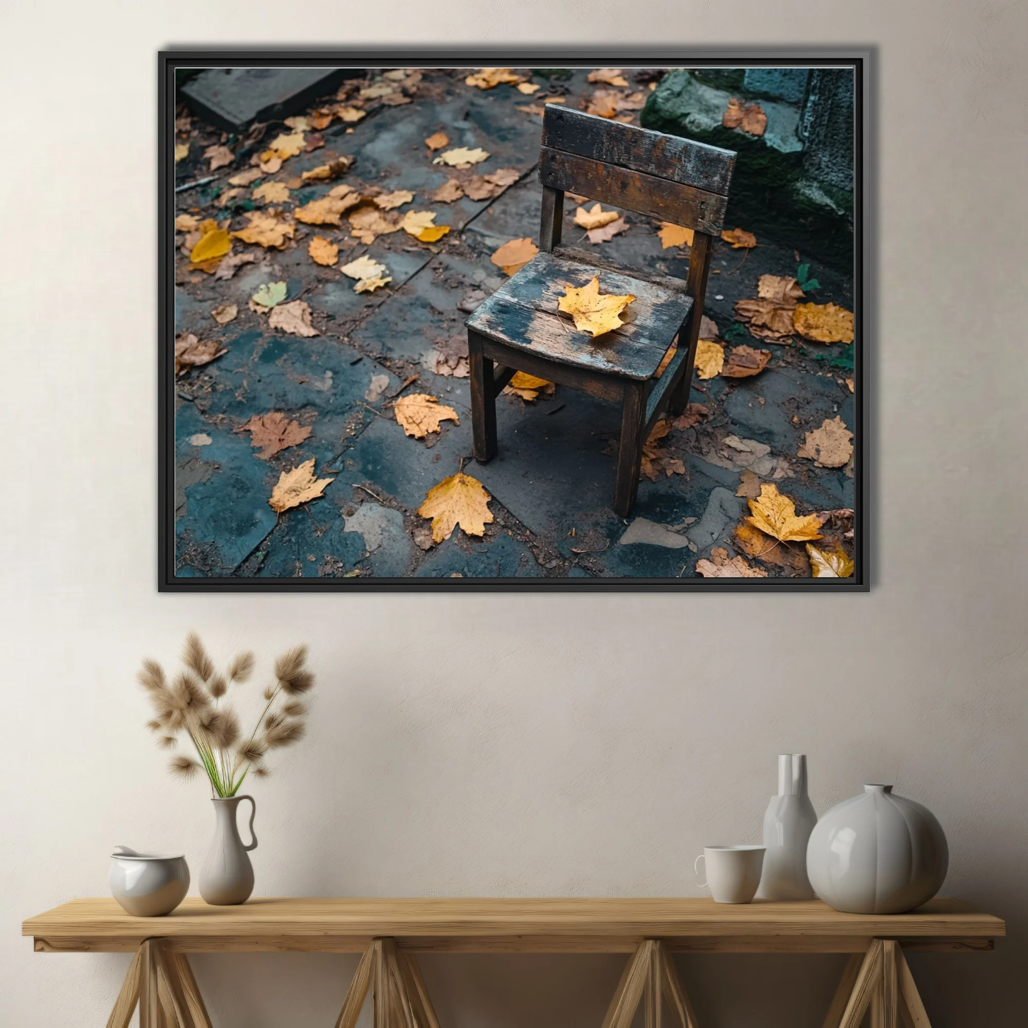 Weathered wooden chair with autumn leaves on mossy stone paving, moody fall palette