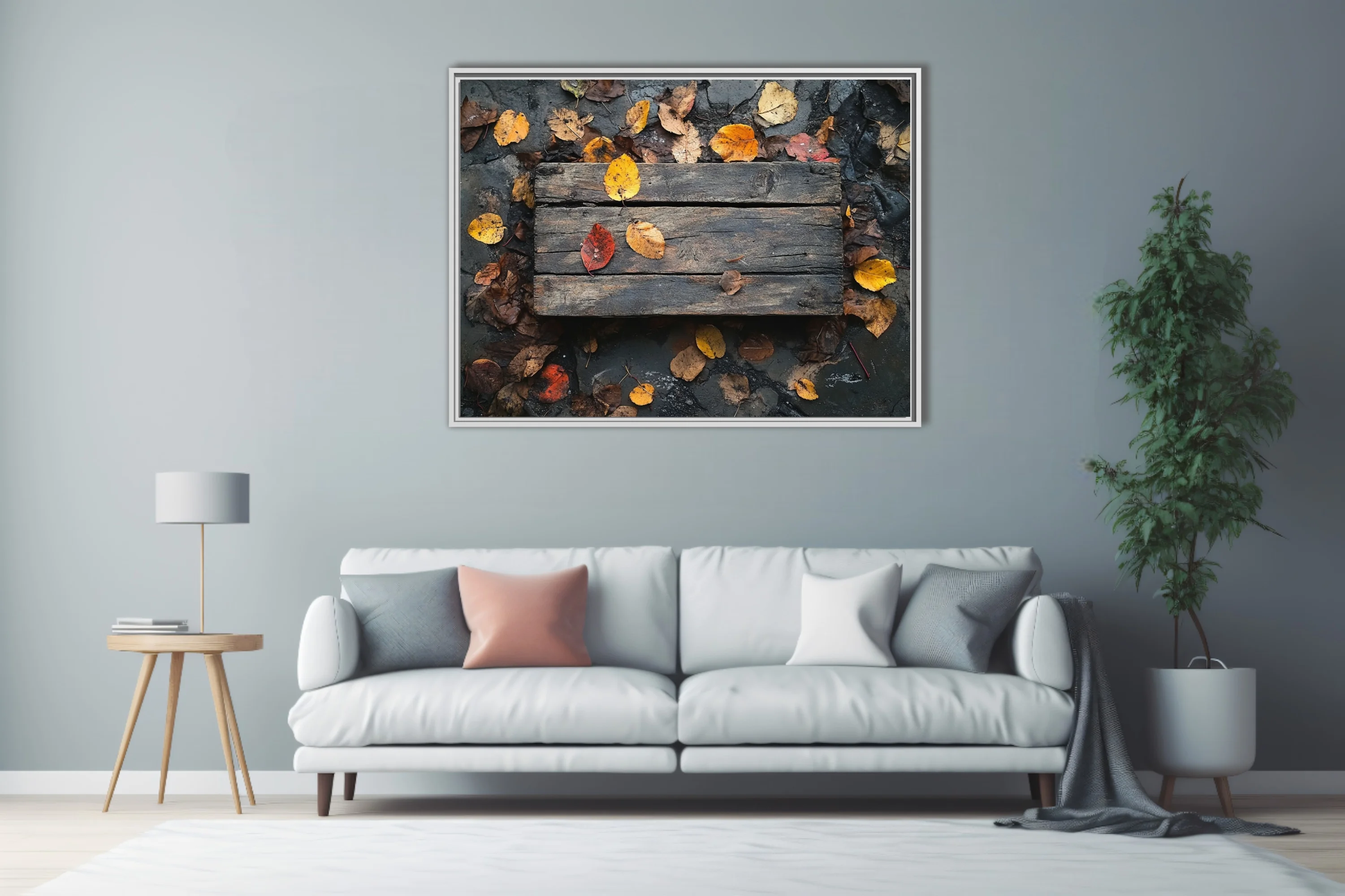 Rustic weathered wood planks with scattered autumn leaves in amber and red tones