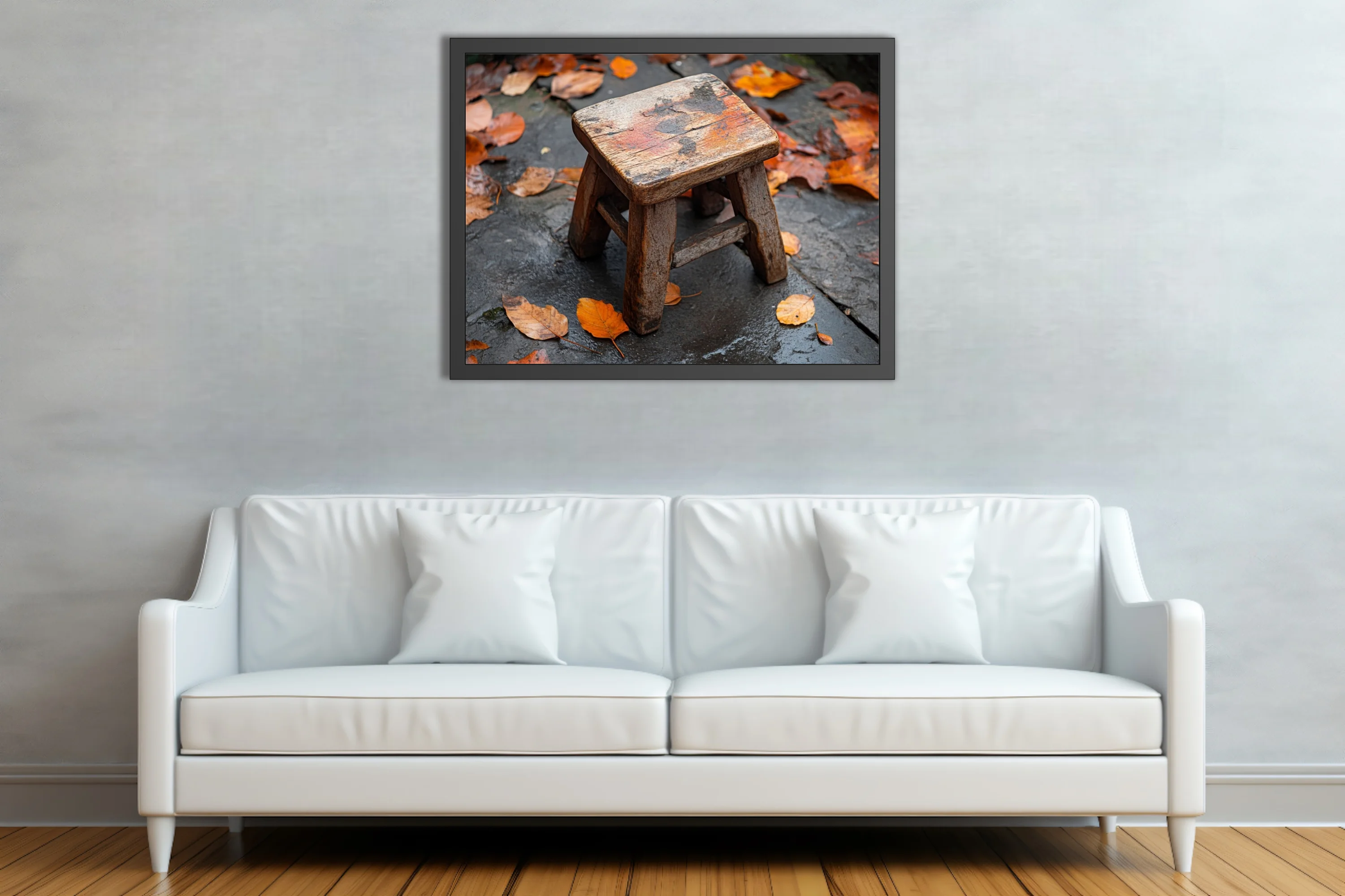 Rustic weathered wooden stool on wet stone surrounded by autumn leaves