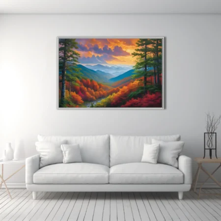 Autumn mountain landscape with fiery sunset sky and layered misty ridges
