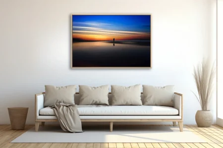 Minimalist twilight seascape silhouette reflected on wet sand, blue-orange sunset palette