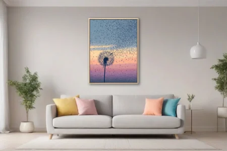 Minimalist dandelion silhouette with seeds drifting across pastel sunset sky