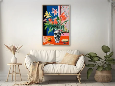 Saturated floral still life — bold lilies in orange, yellow and pink in a decorative ceramic vase