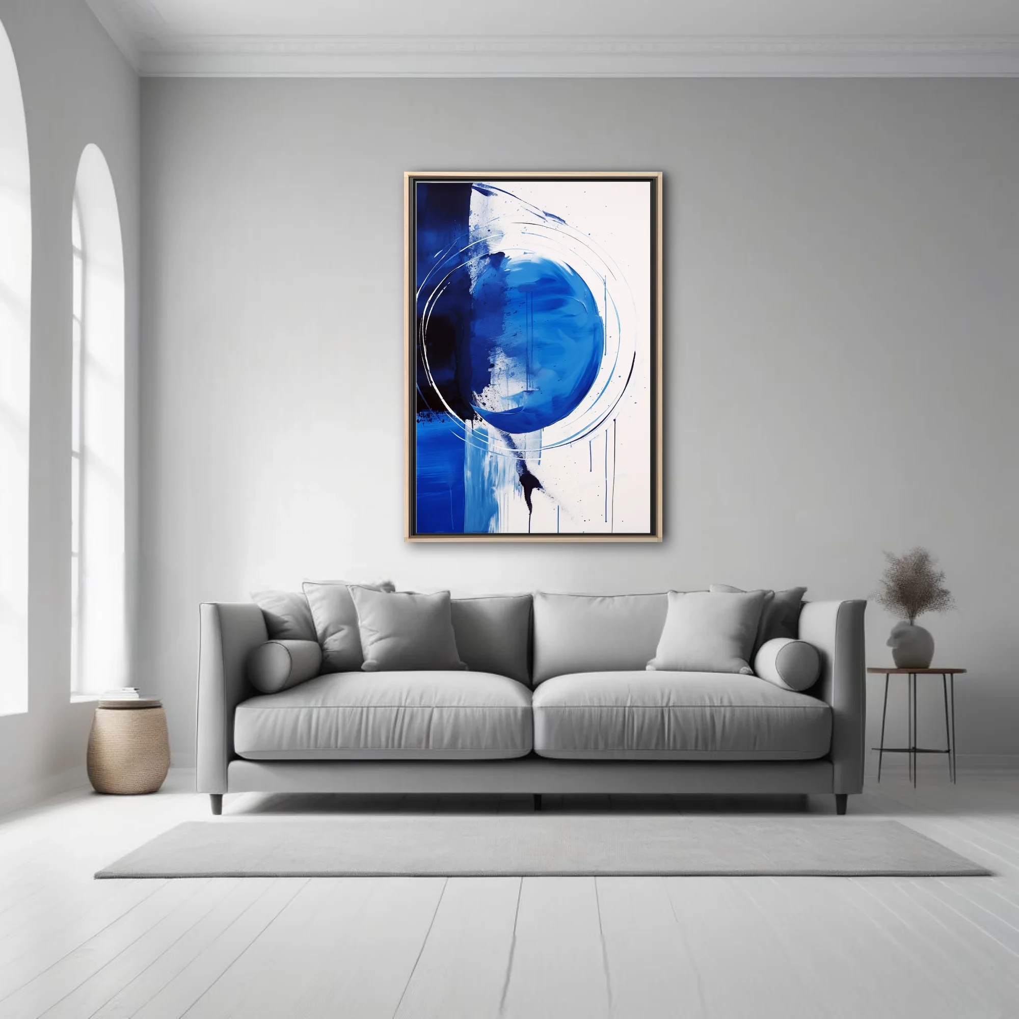 Bold cobalt and ink-blue abstract artwork with circular gesture, drips, and white ground