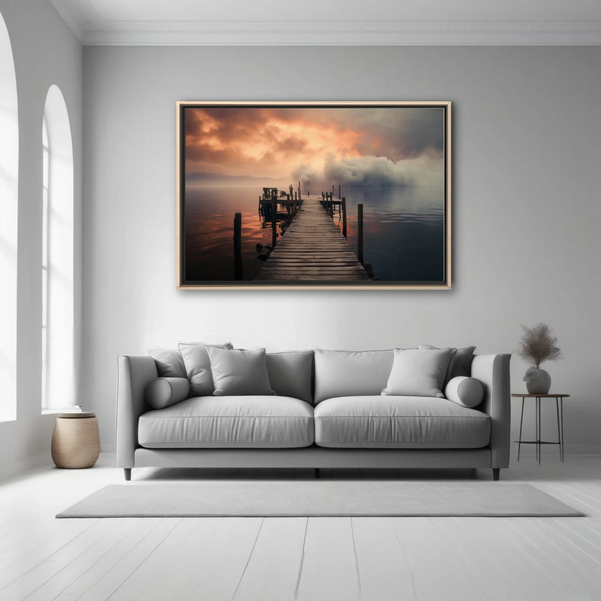 Misty lake pier at dramatic amber and grey sunset