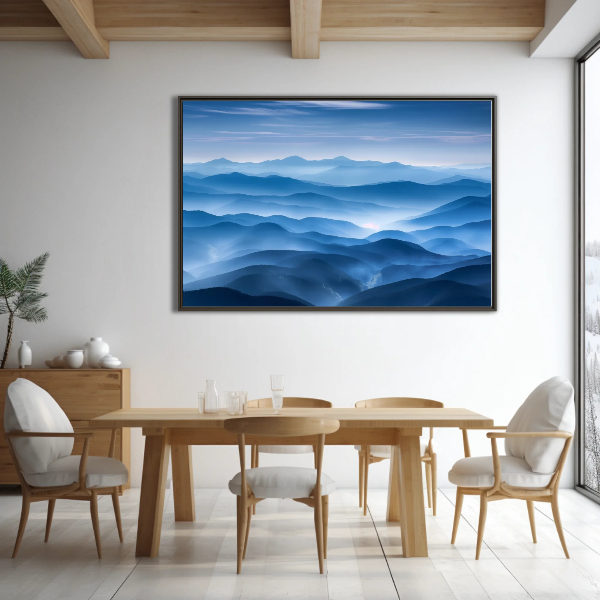 Misty layered mountain landscape in cool blue tones with atmospheric haze and soft glow