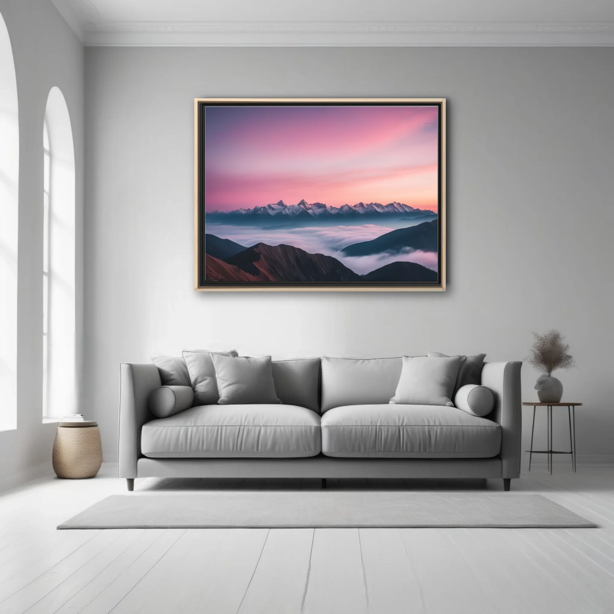 Mountain landscape with pink-violet sunrise sky and sea of clouds