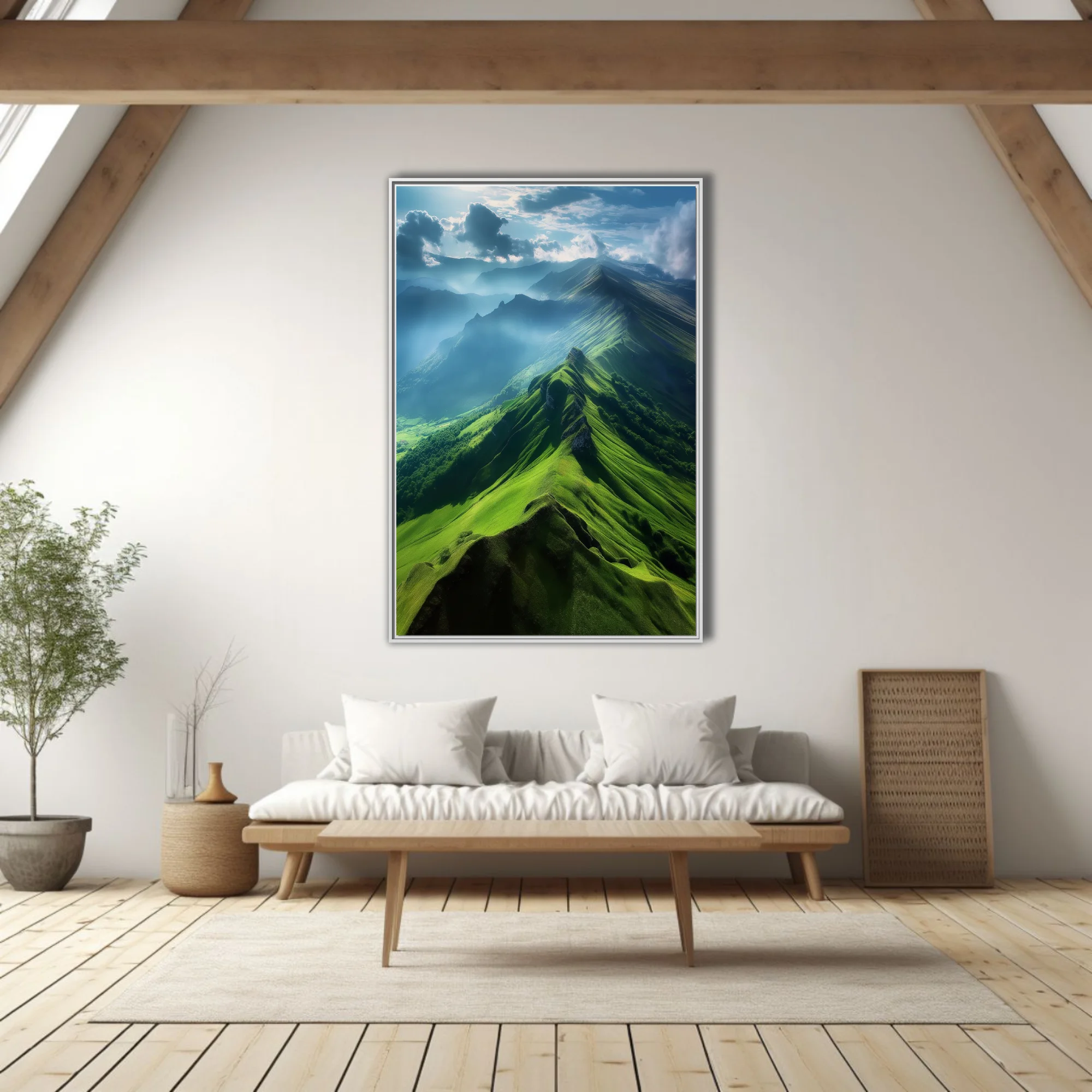 Aerial green mountain ridgeline with dramatic clouds and misty valleys