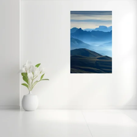 Misty blue mountain ranges with layered ridgelines and atmospheric haze