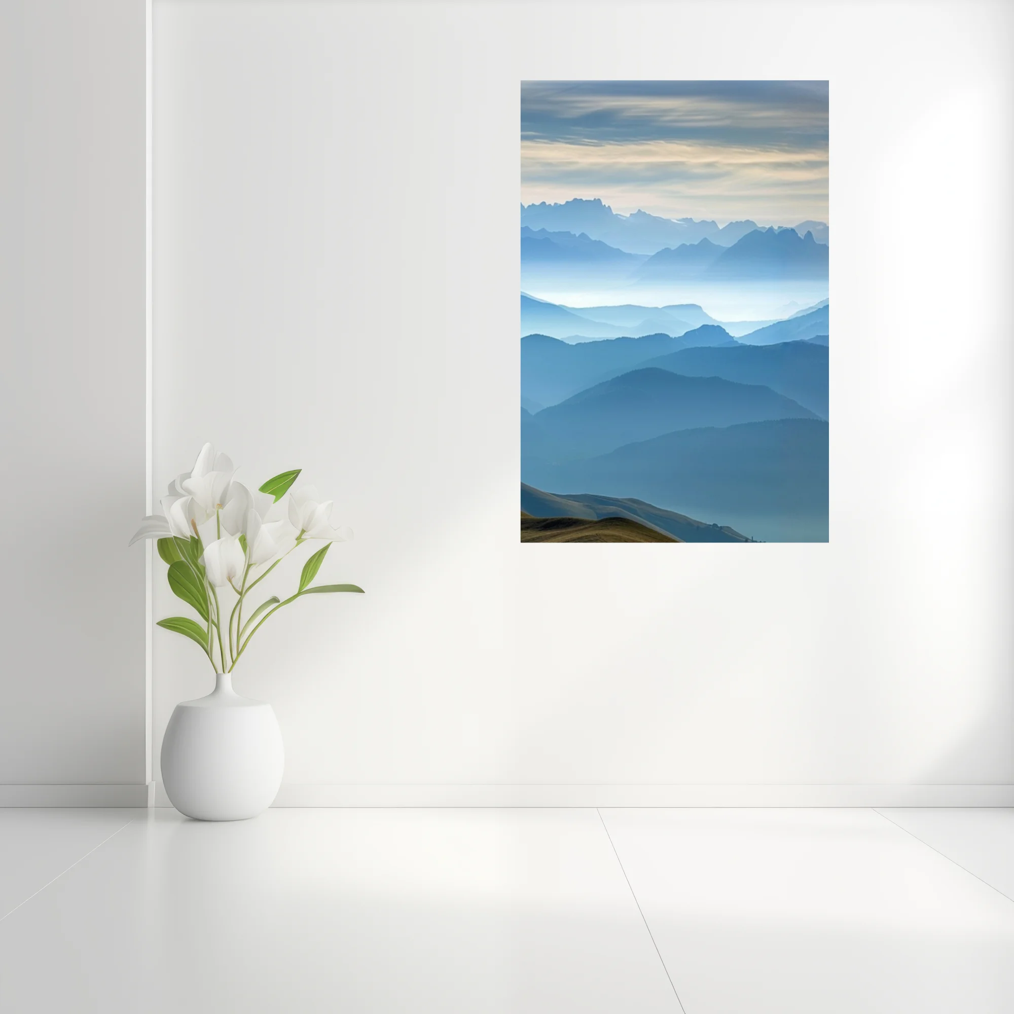 Misty blue layered mountain landscape with atmospheric haze and alpine ridgelines