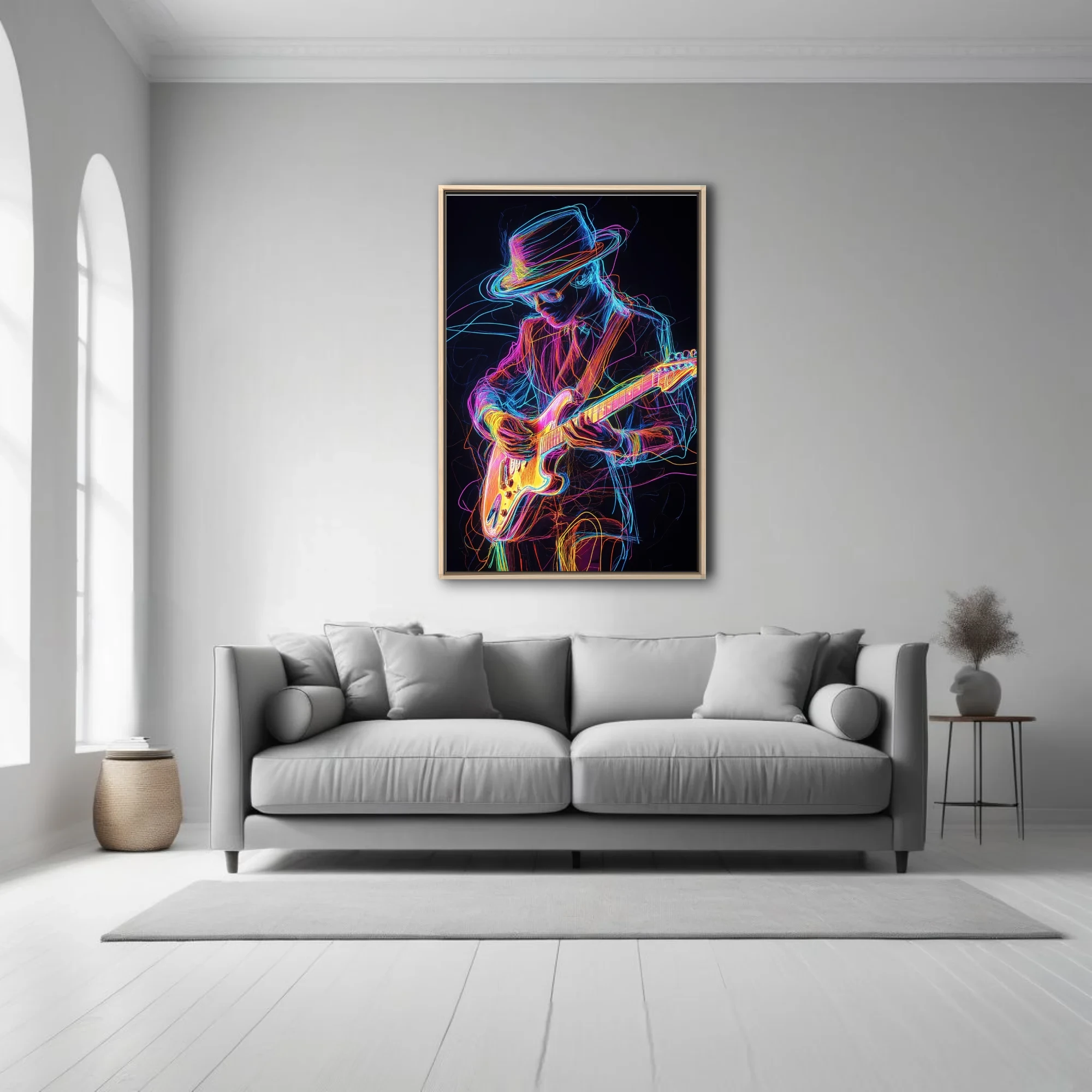 Neon light-drawing of electric guitarist in wide-brimmed hat, vivid multicolor on black