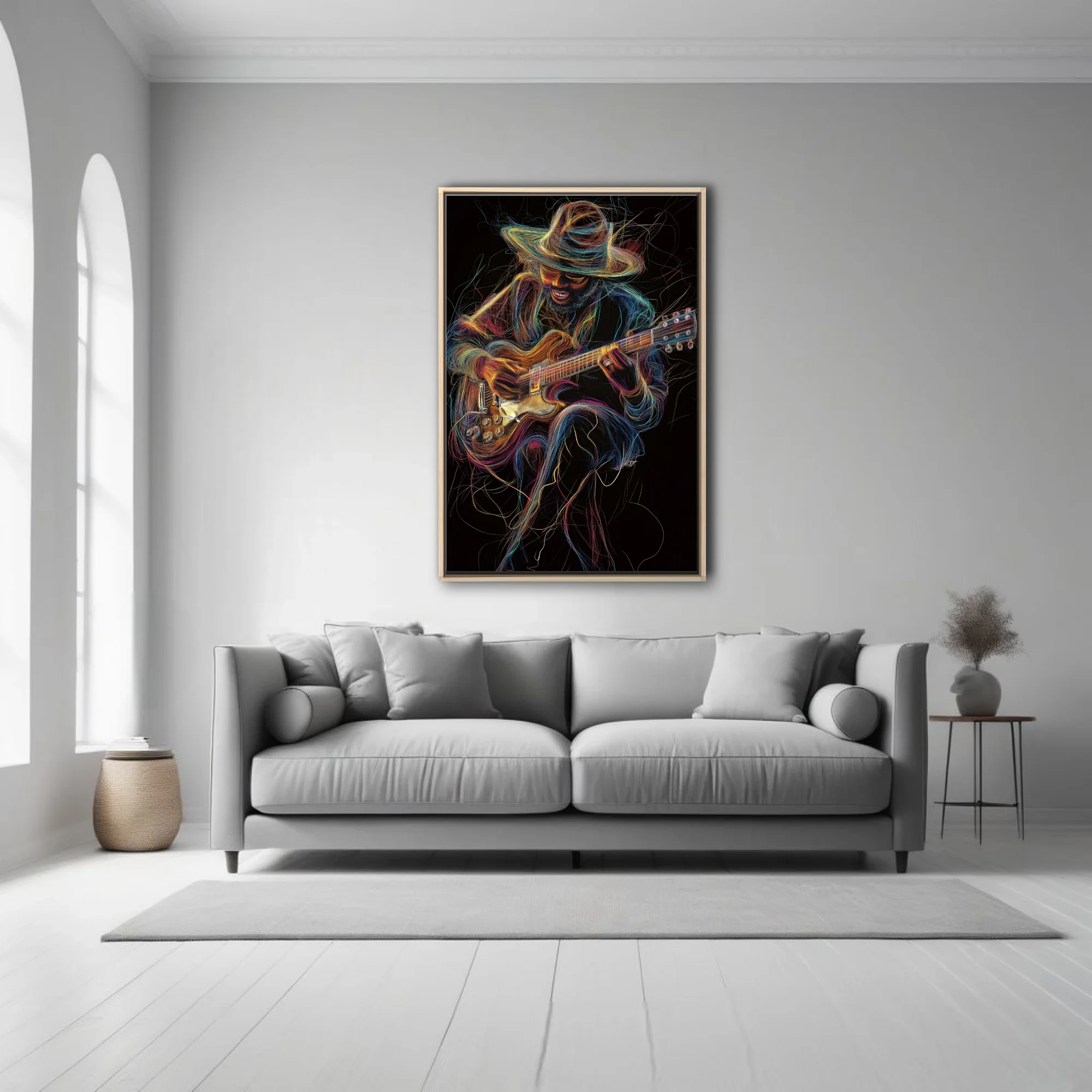 Vibrant line-art portrait of a hat-wearing guitarist in neon threads on black, kinetic music wall art