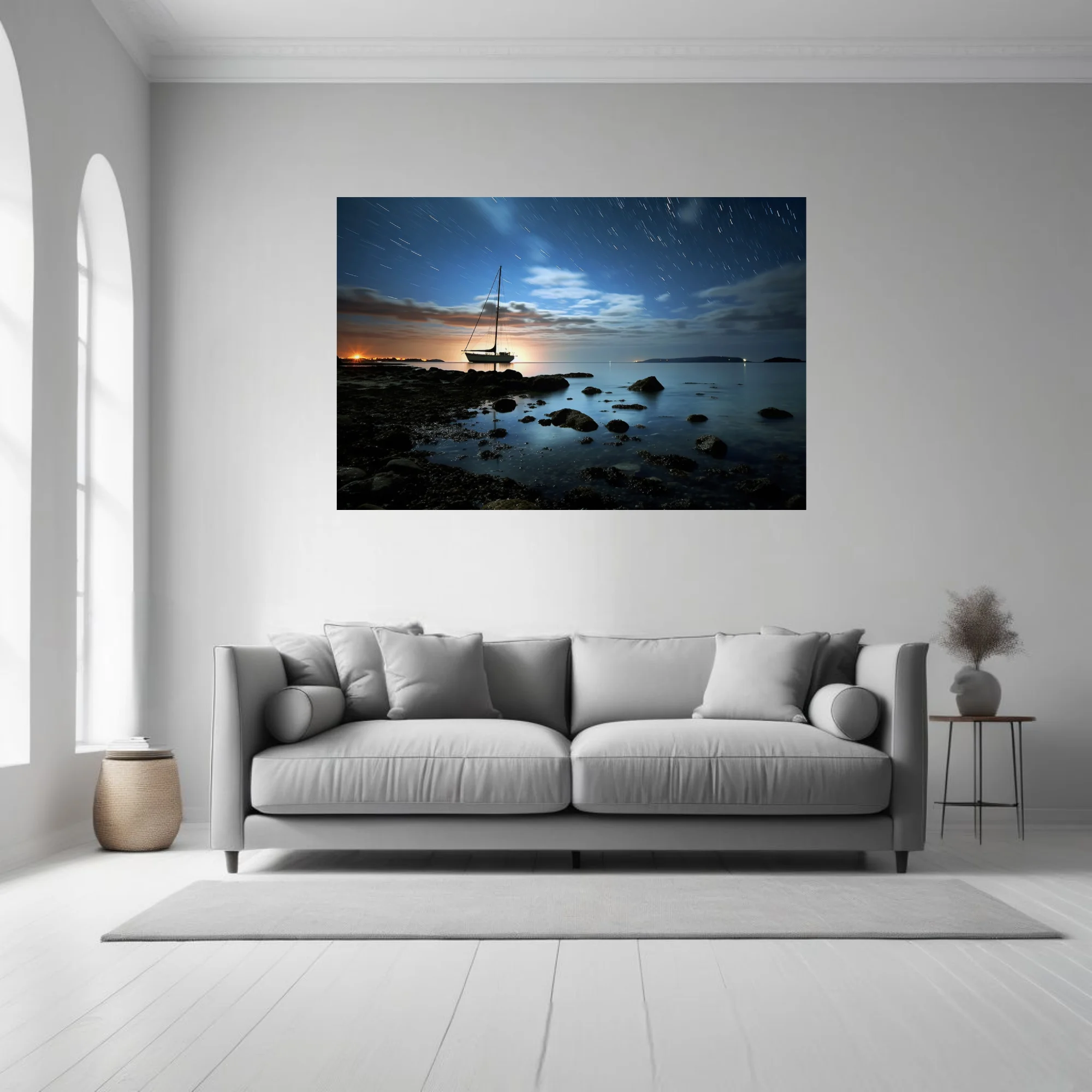 Long-exposure night seascape with sailboat silhouette, star trails, and glowing horizon