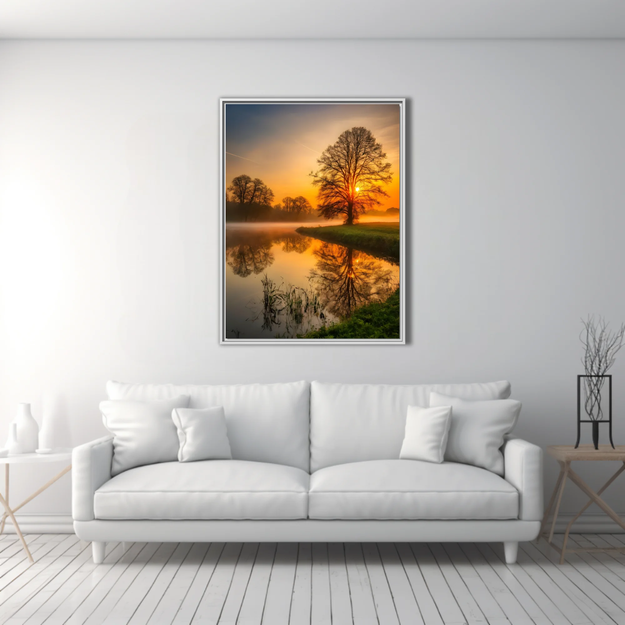 Misty golden sunrise landscape with tree silhouettes reflected in calm river
