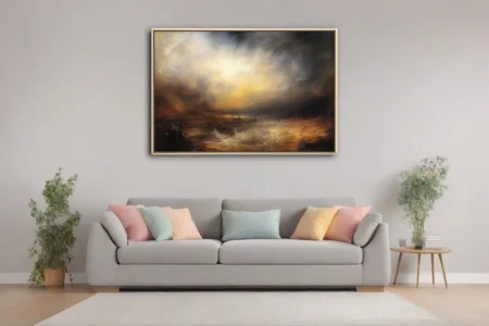 Romantic sublime seascape with stormy amber skies and dramatic light break