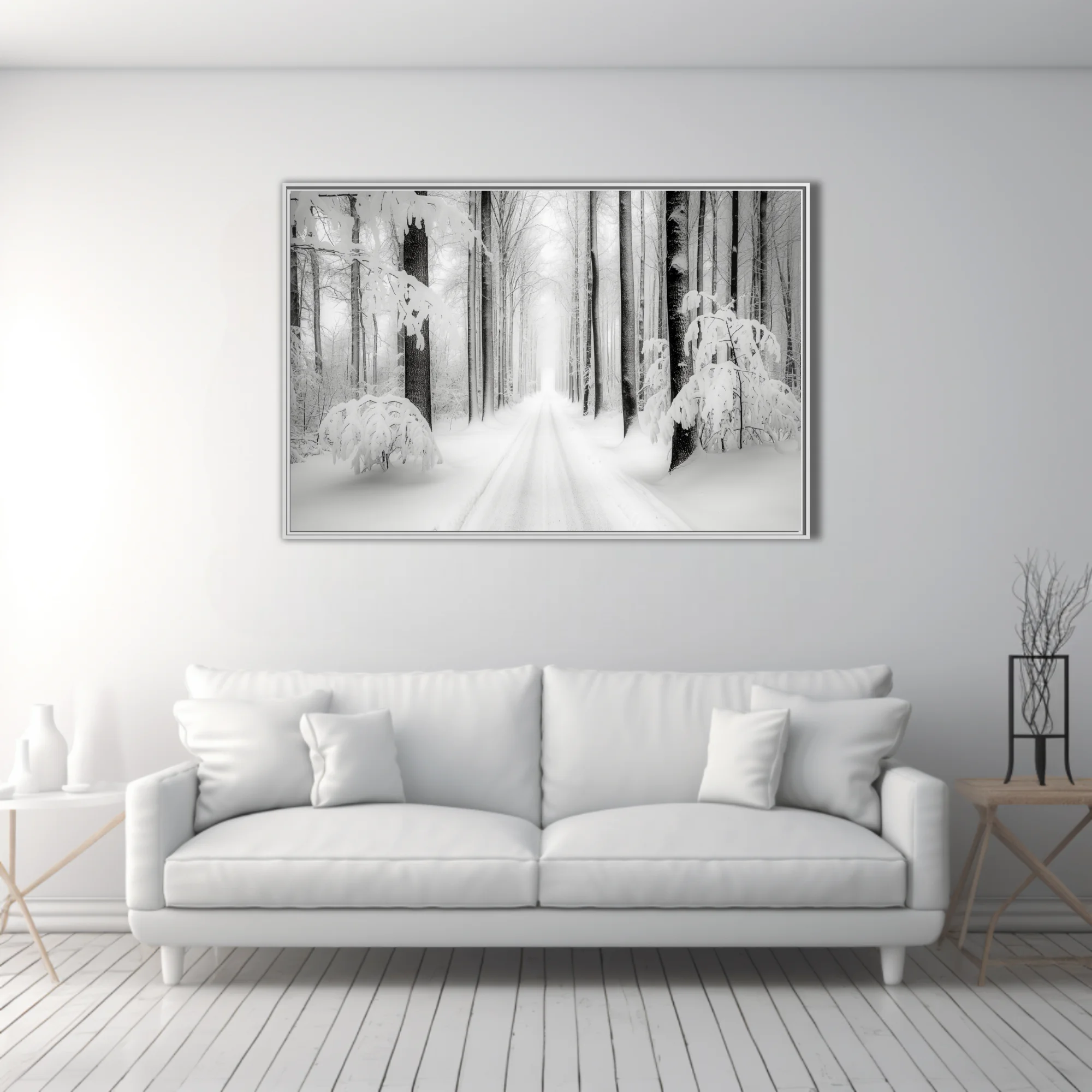 Black-and-white snowy forest road lined with frost-covered trees