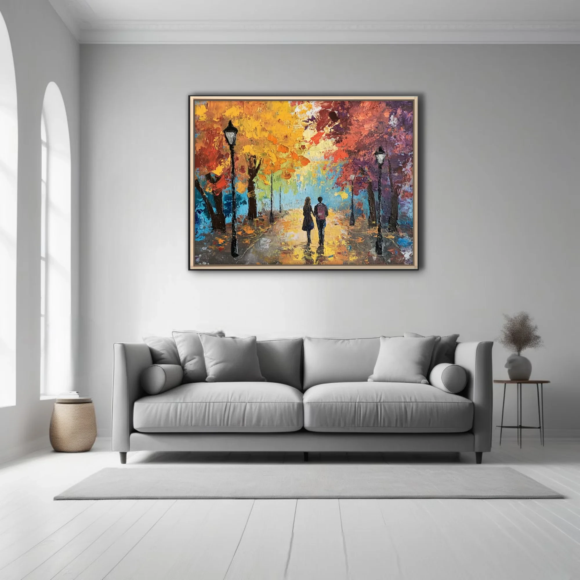 Couple walking through autumn park, landscape in fiery orange, gold, and blue