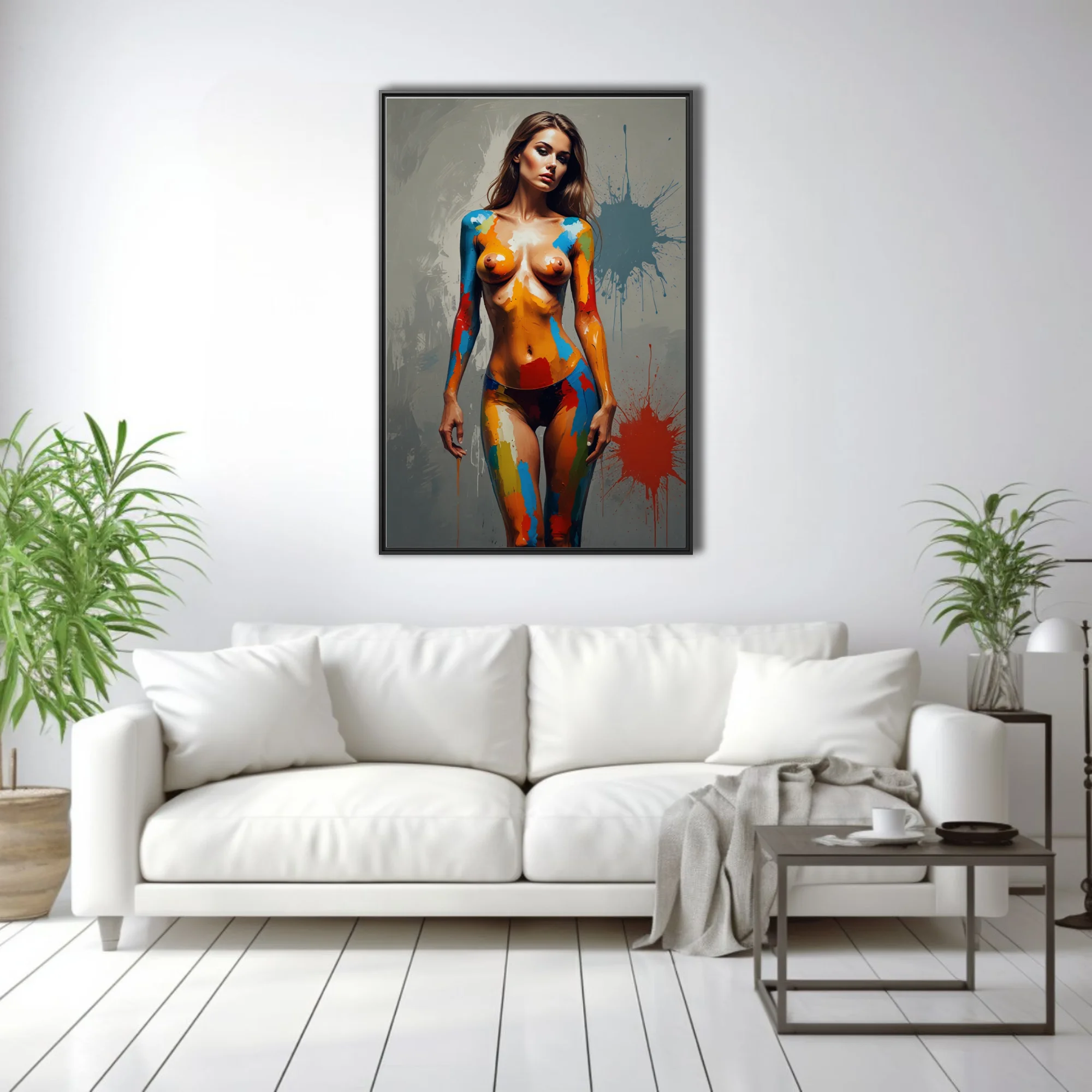 Contemporary nude figure study with vivid primary body-paint strokes and grey splatter backdrop