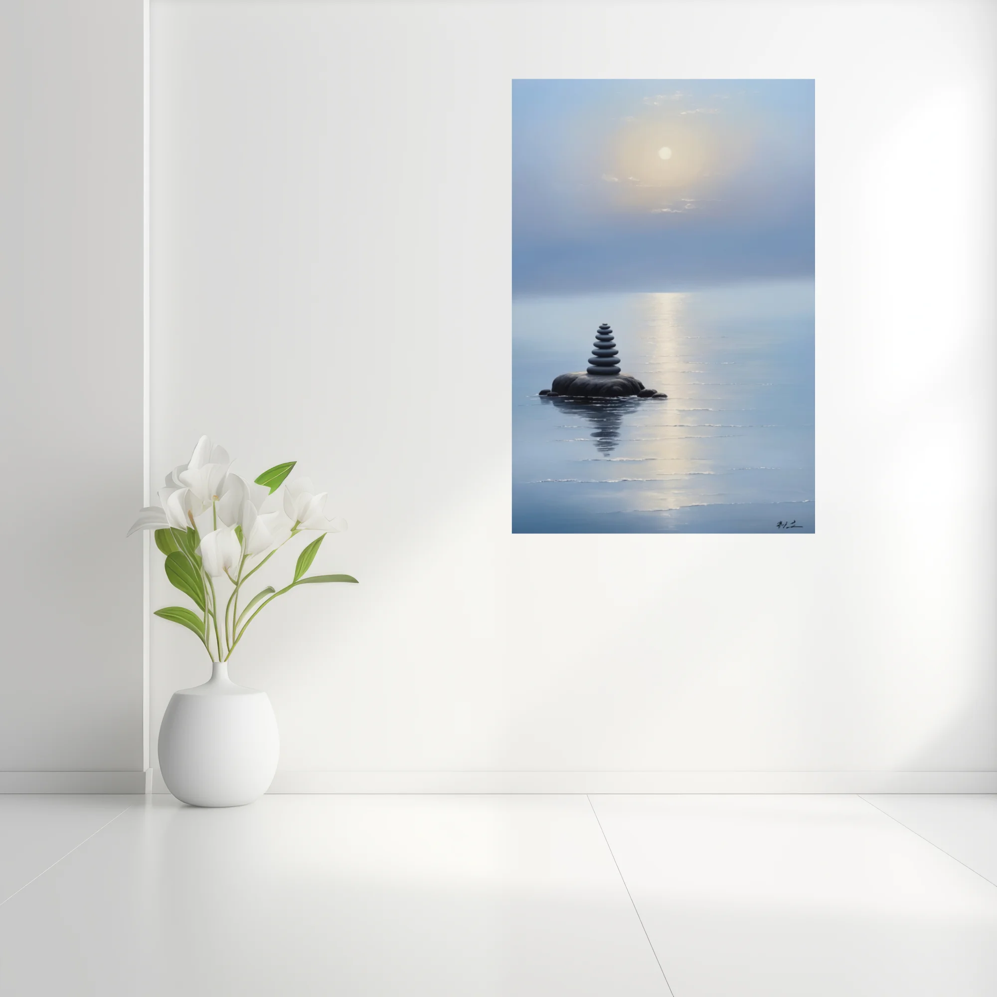 Minimalist zen stone cairn on still misty water with glowing sky