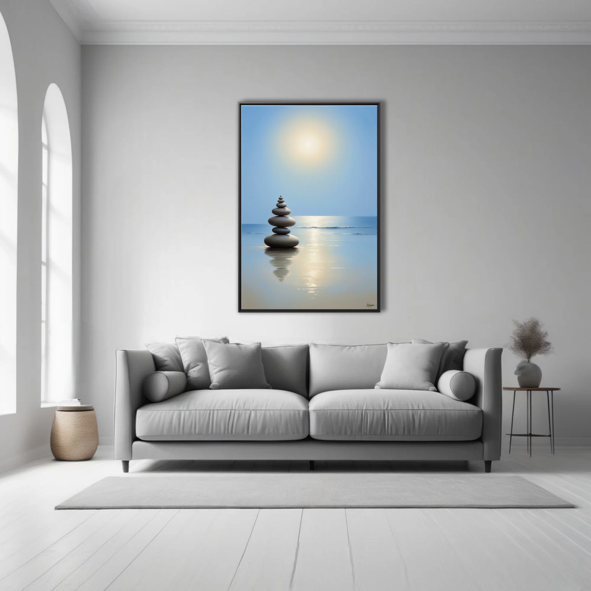 Minimalist zen stacked stones on calm reflective beach, soft blue and gold tones
