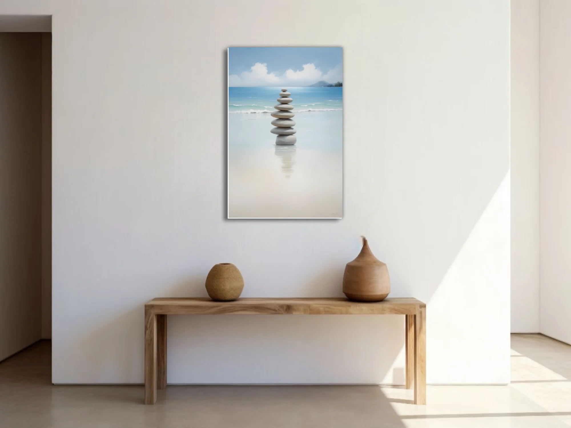 Minimalist zen stacked stones on calm beach, soft aqua and sand tones