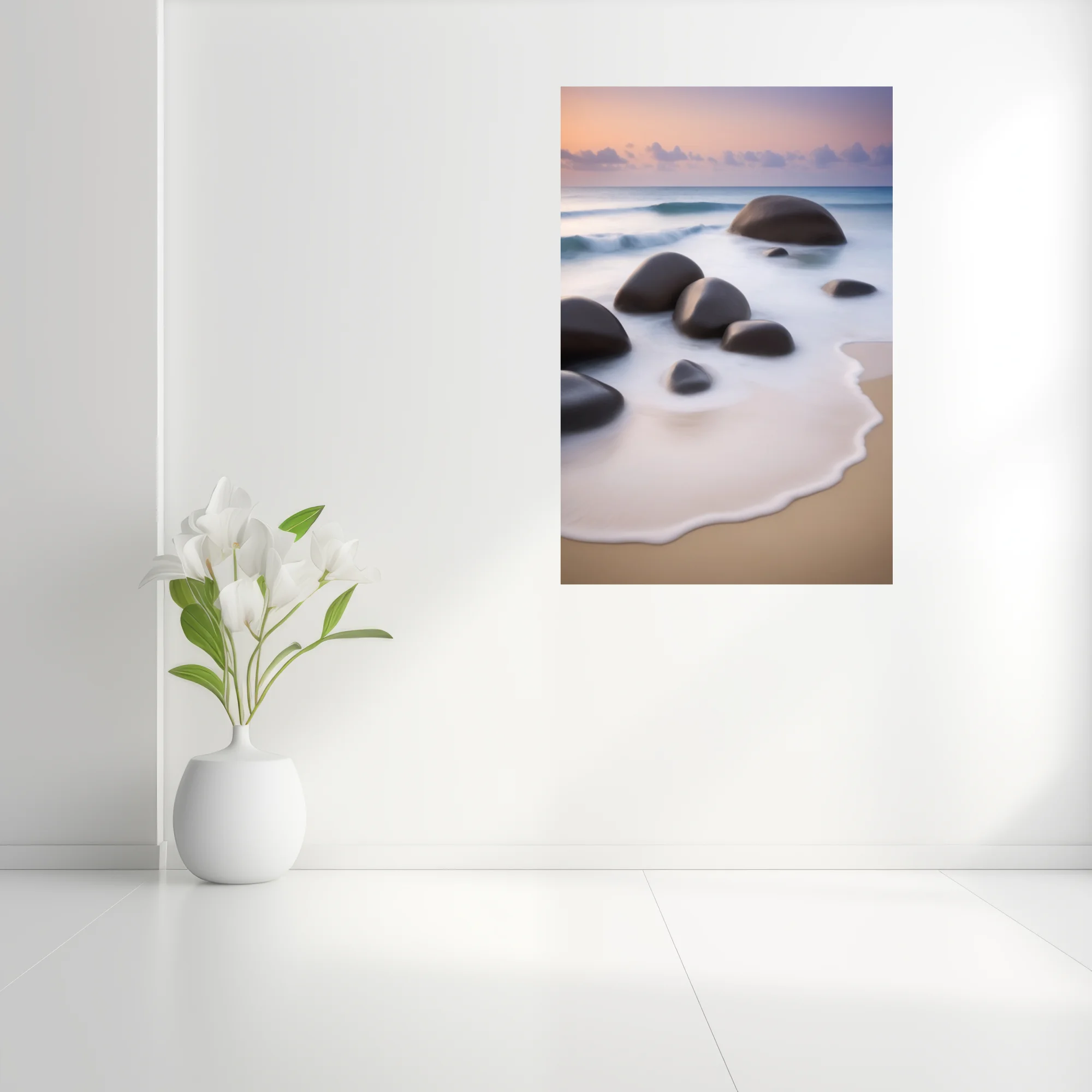 Long-exposure seascape with smooth boulders, silky foam, and pastel dusk sky