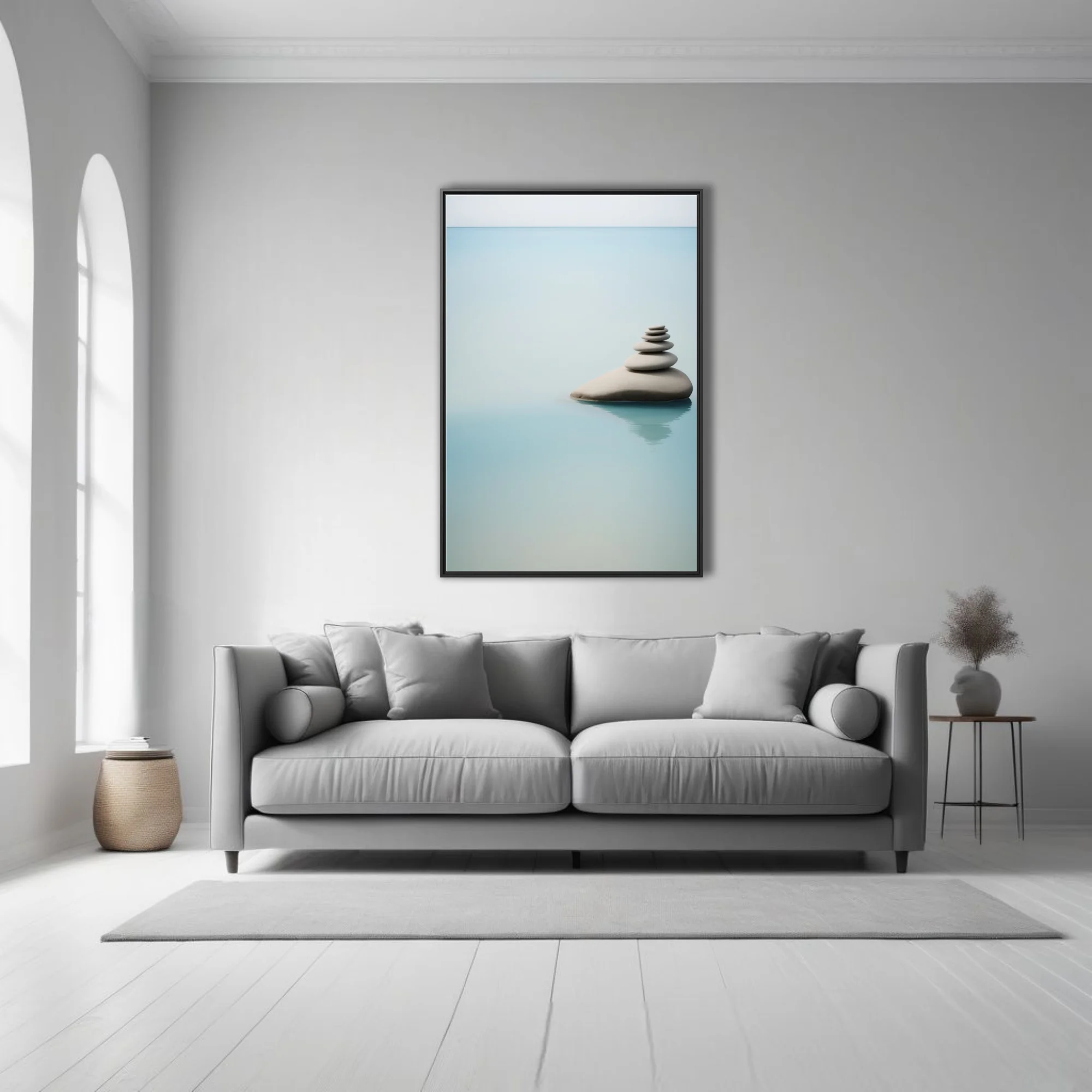 Minimalist stacked stones on still water, cool aqua palette, serene